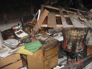 Fire damaged office with debris
